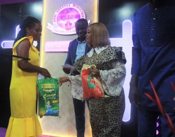 A gift being presented during a community event