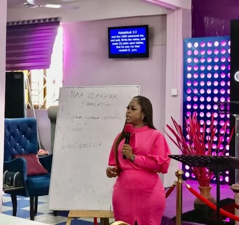 A facilitator presenting at a whiteboard