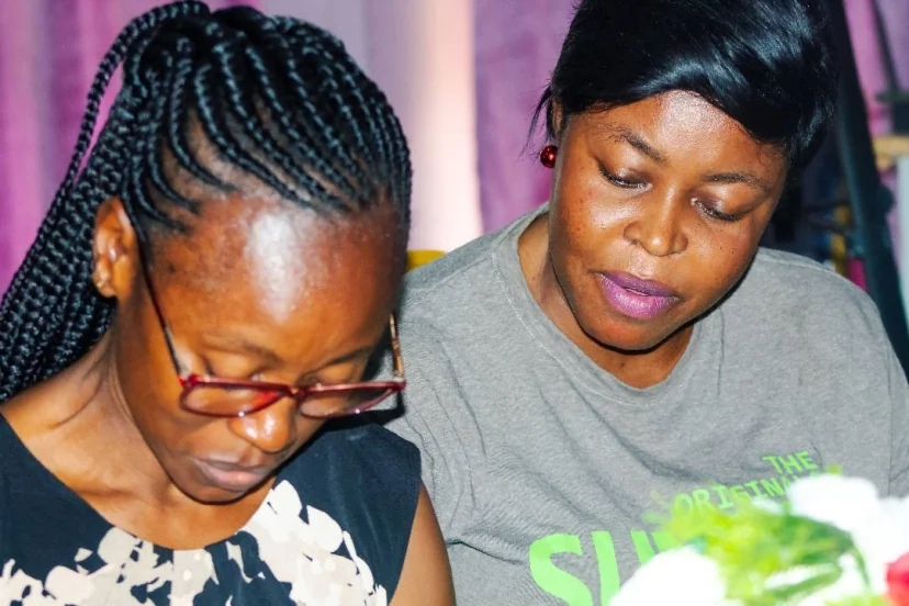 Two women working together during a programme activity